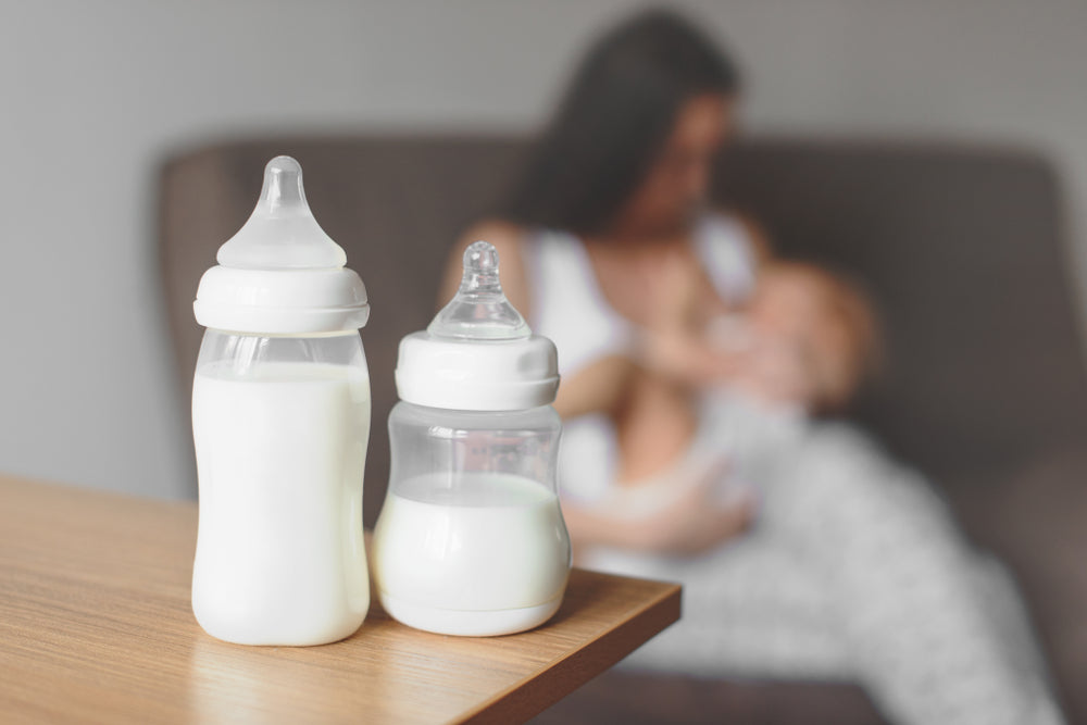 Baby bottles filled with milk supply
